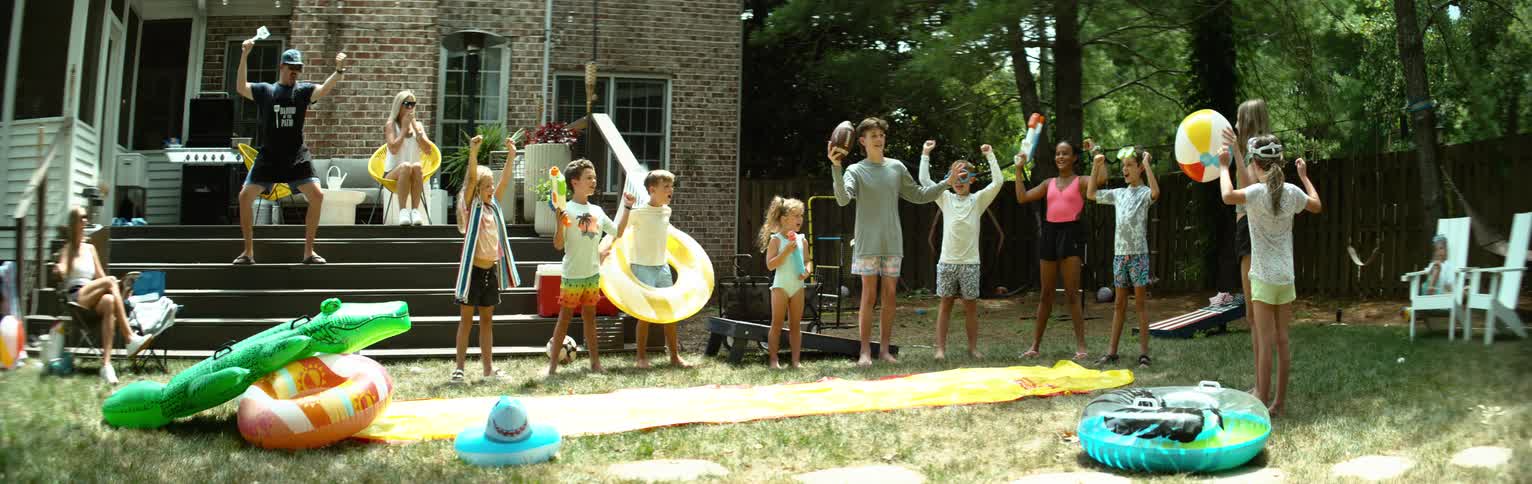 Children are having fun at a part in the yard