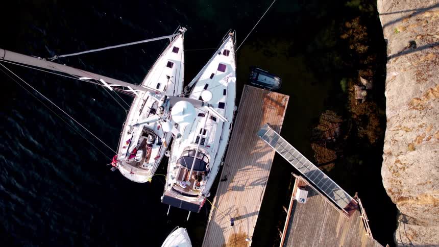 Top view of sailboats parked at a dock