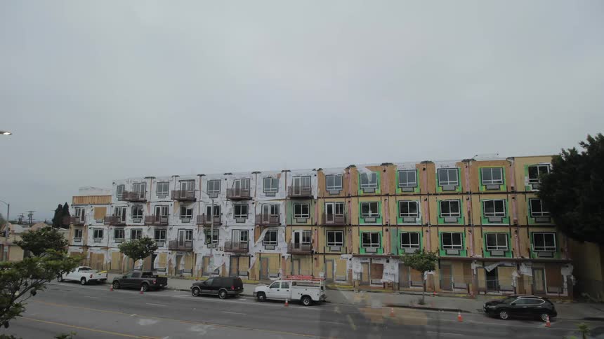 An apartment complex is built over time