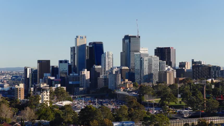 Panorama of a metropolis with modern skyscrapers on a cloudless blue sky day