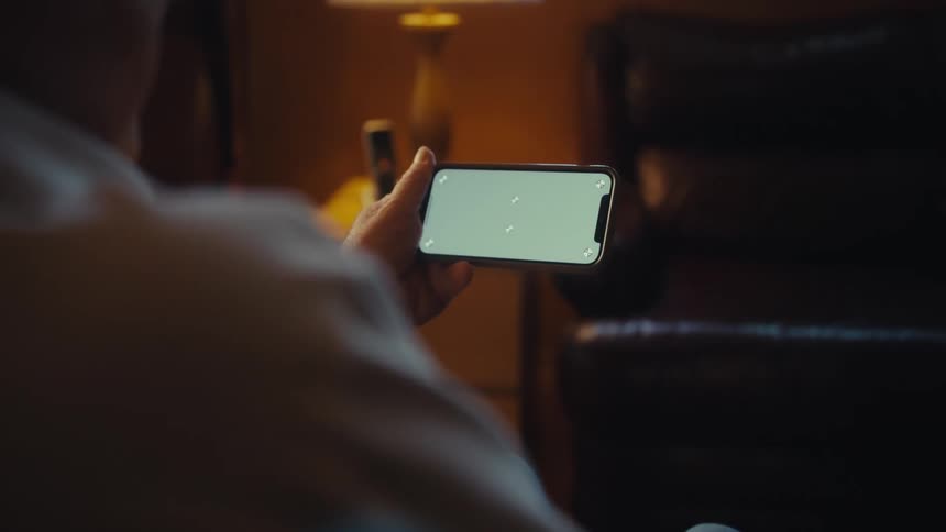 A person looks at a phone screen