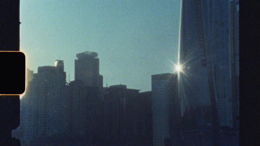 The sun peaks on the side of the tower