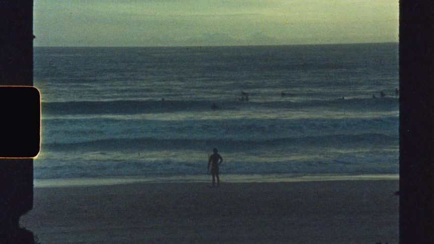 People on the beach at sunrise