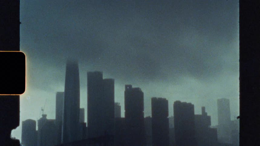 Skyscrapers of a metropolis on a foggy and stormy day