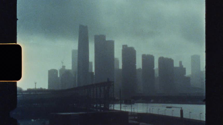 The buildings are covered with heavy fog