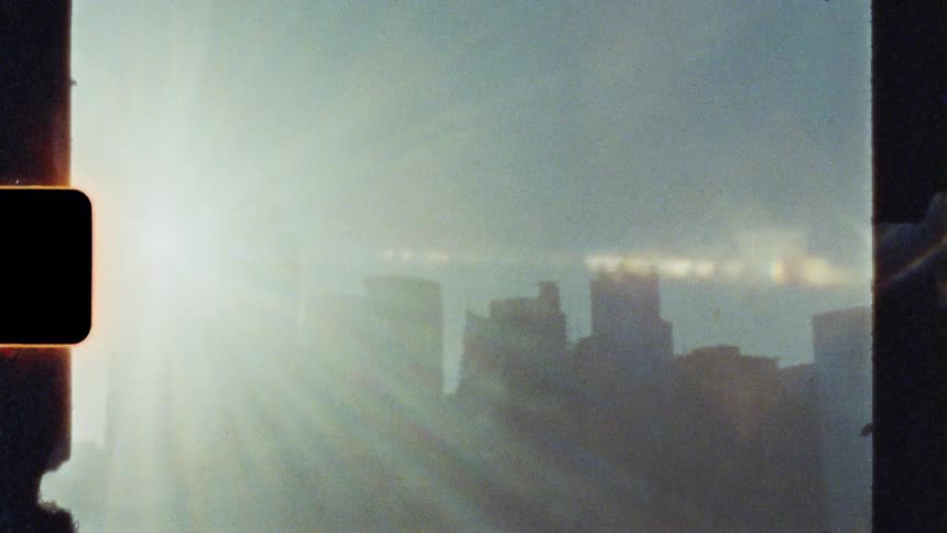 Modern buildings in a metropolis with sun reflection