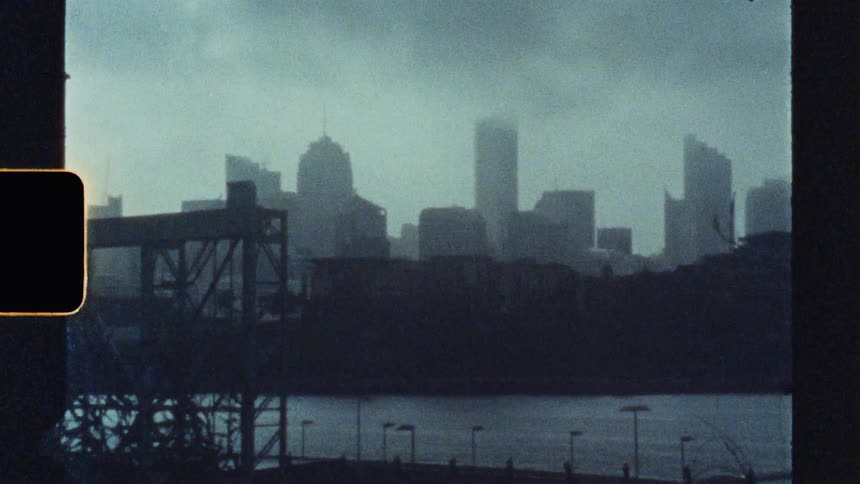 A city skyline beyond the river
