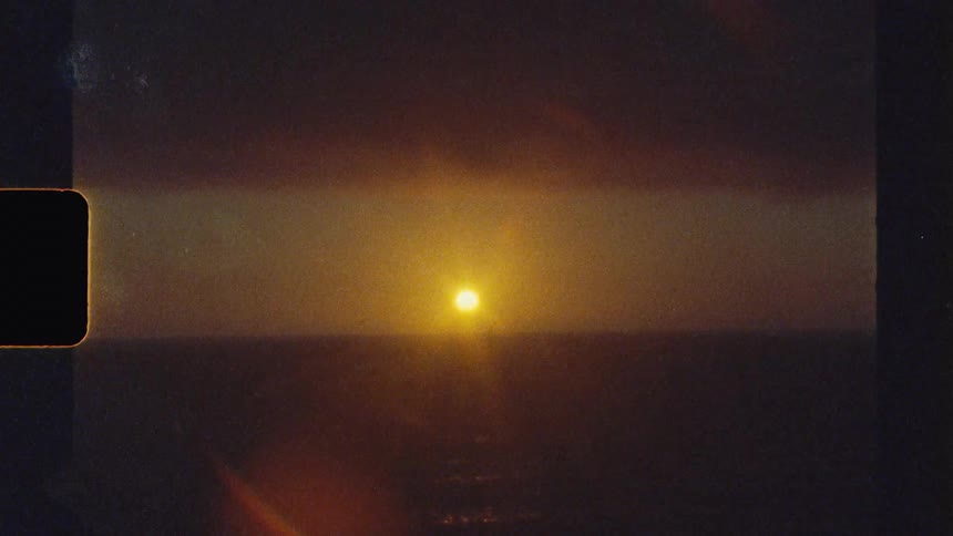 Golden sun on the horizon in a sea landscape