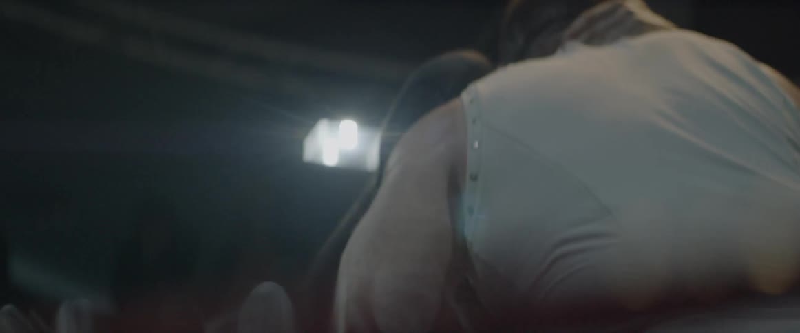 A man hits another with elbows to the face