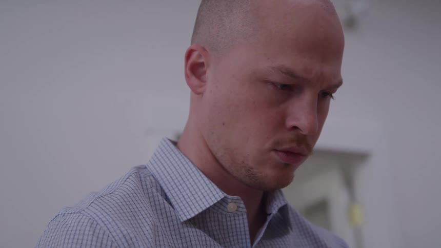 A man looks deep in thought