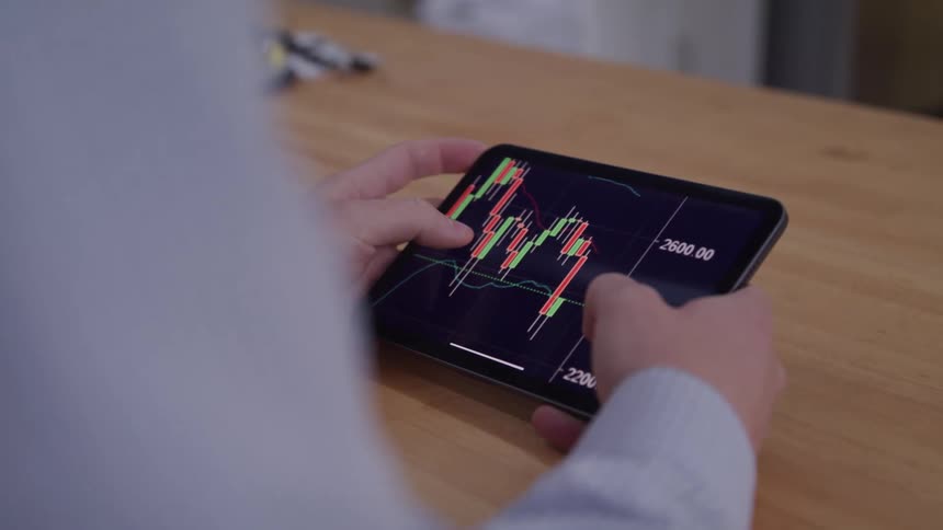 A person looks at a graph
