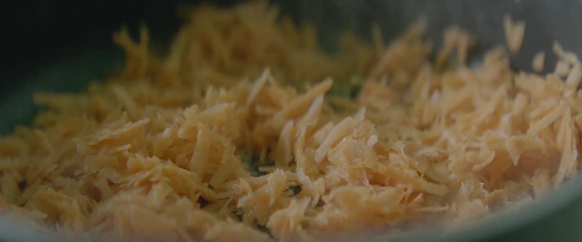 Extreme close-up of food being simmered in a pan