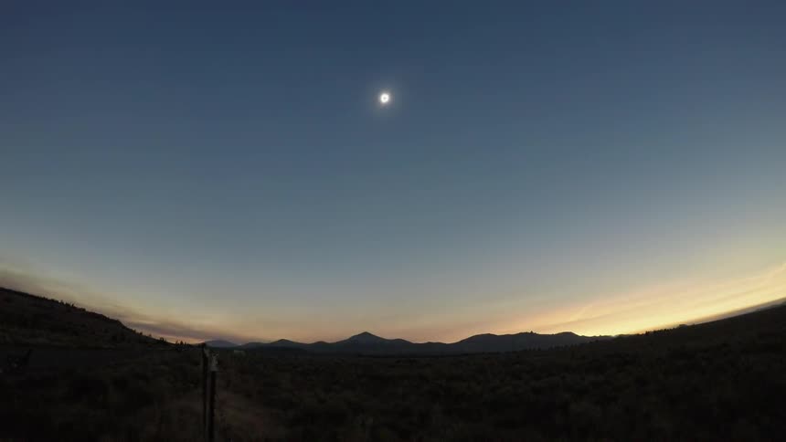 The sun shines down on a desert