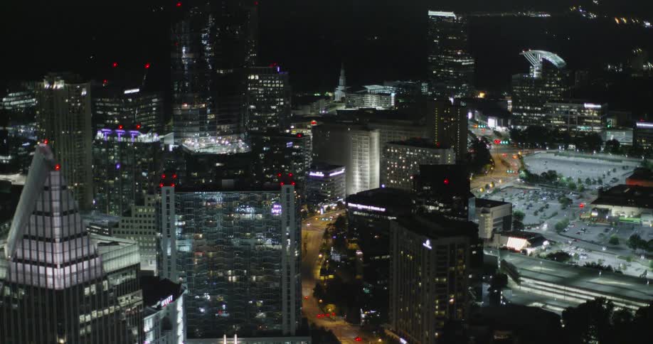 Building and street lights light up a city
