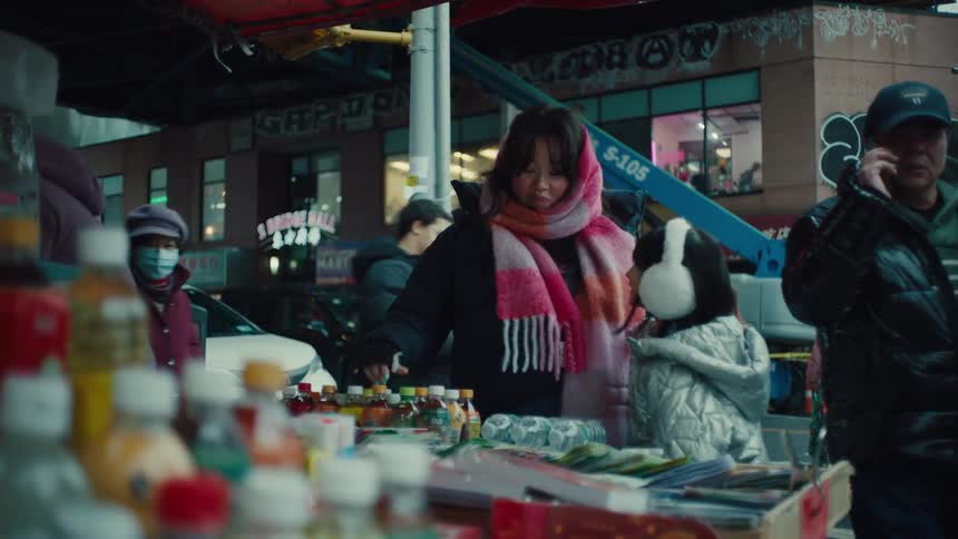 People in a market on a street corner