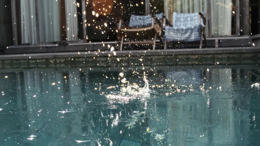 Stone falling into the pool and causing impact