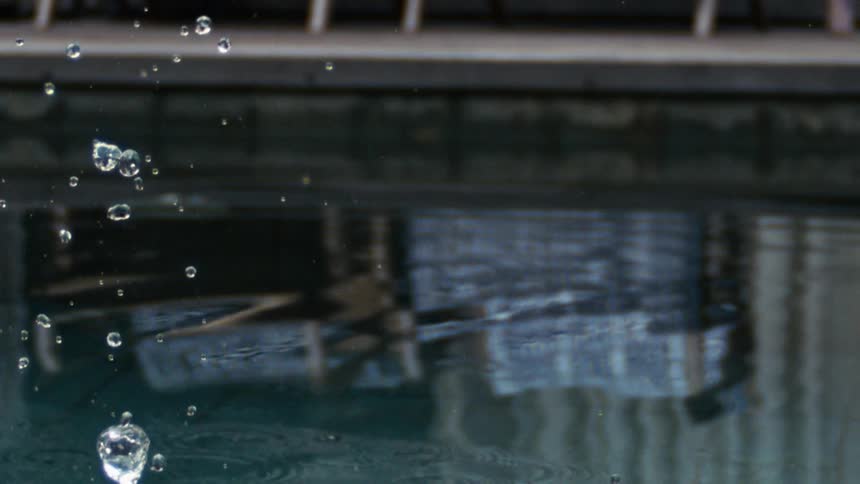 The water in the pool splashes up