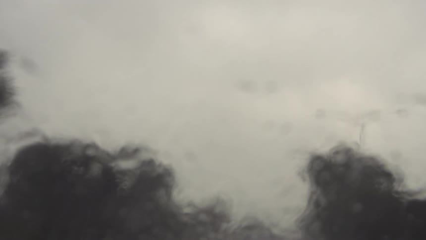 View out of a window on a cloudy rainy day