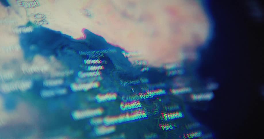 The video shows a quick sequence of abstract digital art with a distorted glitchy effect it features various colored shapes lines and some text that is hard to read due to the visual effects