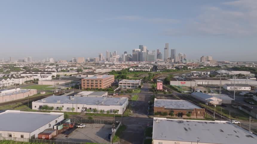 Industrial areas and skyscrapers in a metropolis in the background
