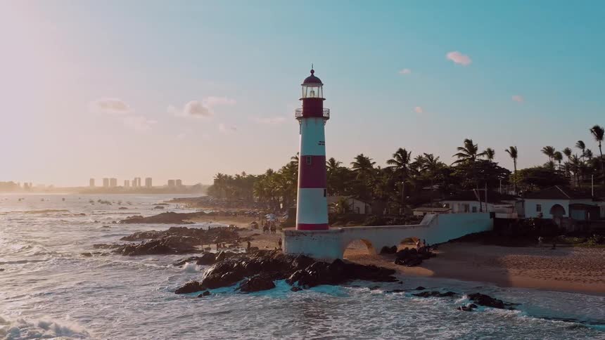 Aerial of a sea watchtower at sunset