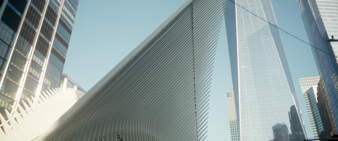 Skyscrapers and unique structure under clear sky