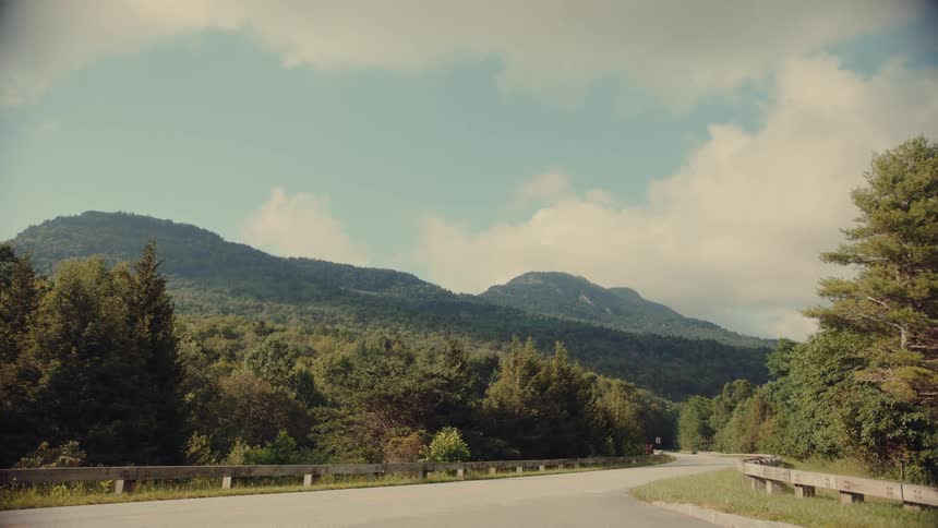 Highway in the middle of wooded mountains