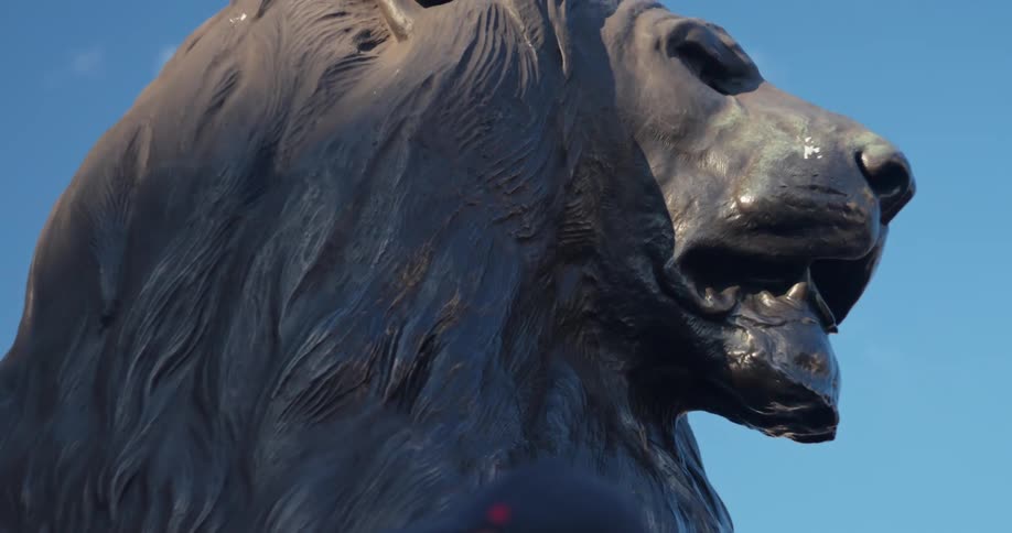Bronze statue of a lion outdoors