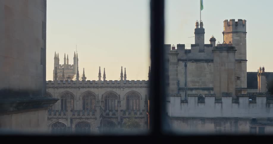 Out the window is a large stone castle