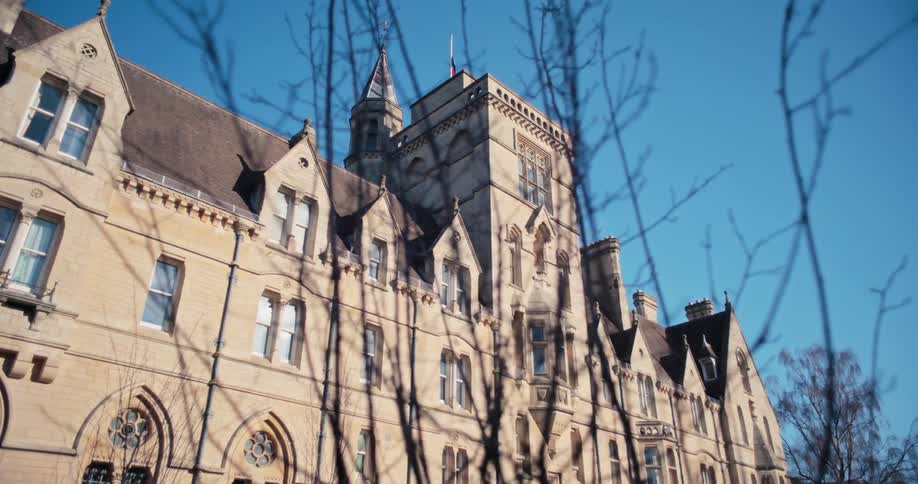 A large mansion is under the blue sky