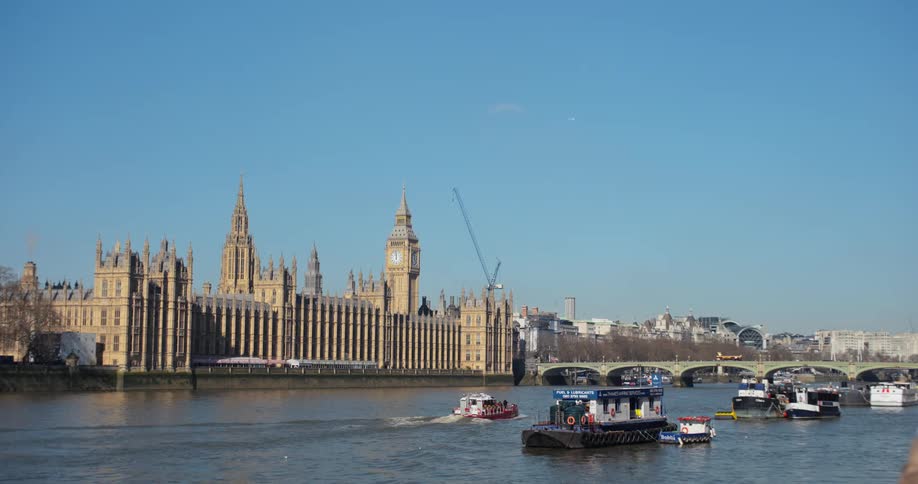 Boats travel through the water near the castle