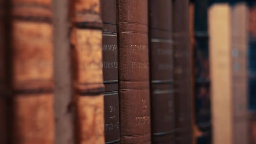 A close up of some old books