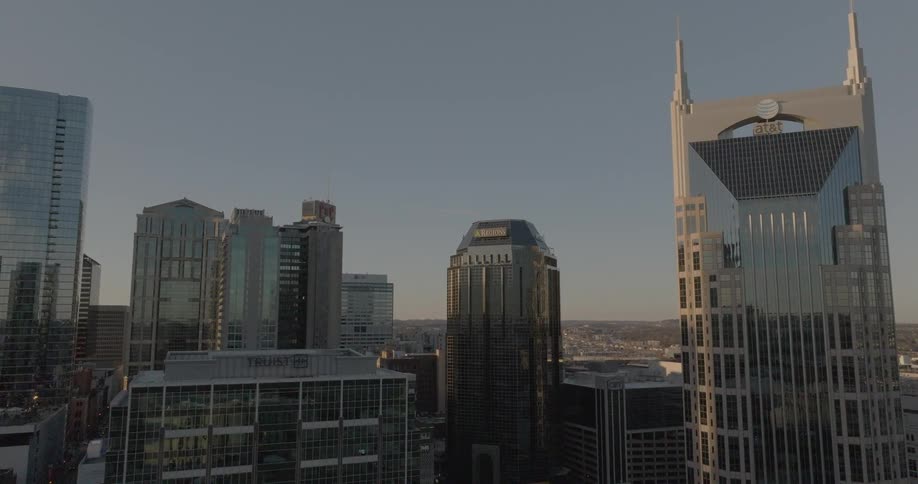 Aerial of high rise buildings in a metropolitan city skyline during daytime