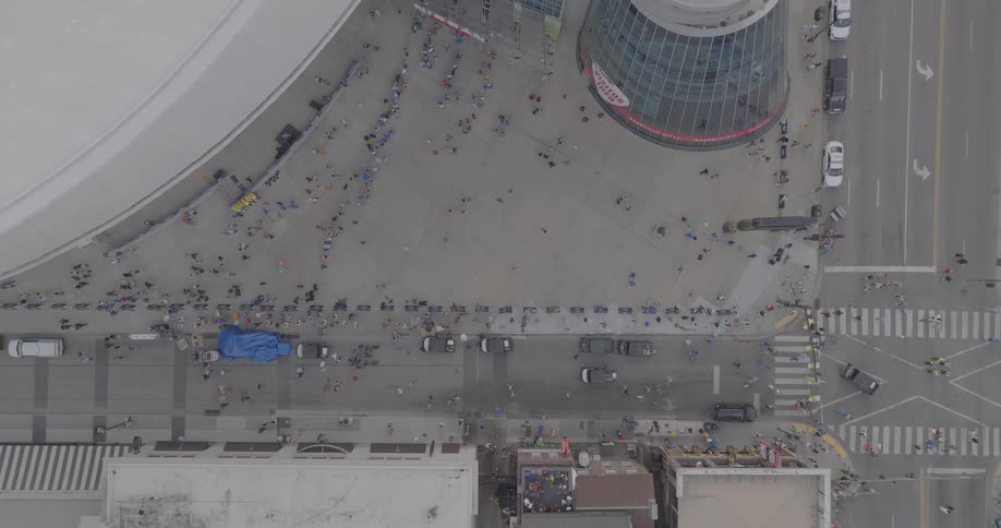 Aerial of a busy road intersection in a metropolitan city during daytime