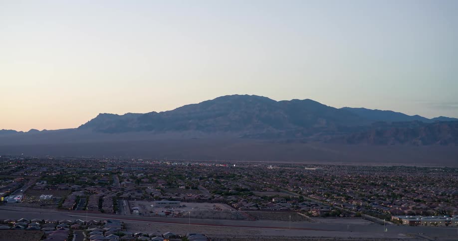 A town full of homes are by the mountain