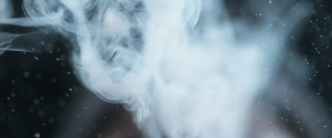 View of some smoke with small particles flying around
