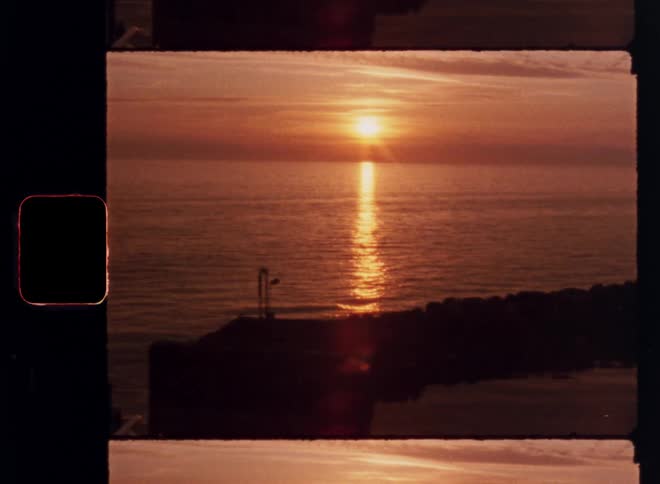 Ocean landscape with sunrise on the horizon