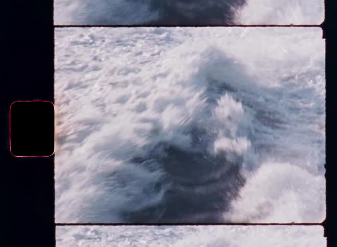 Waves crest in the wake of a boat