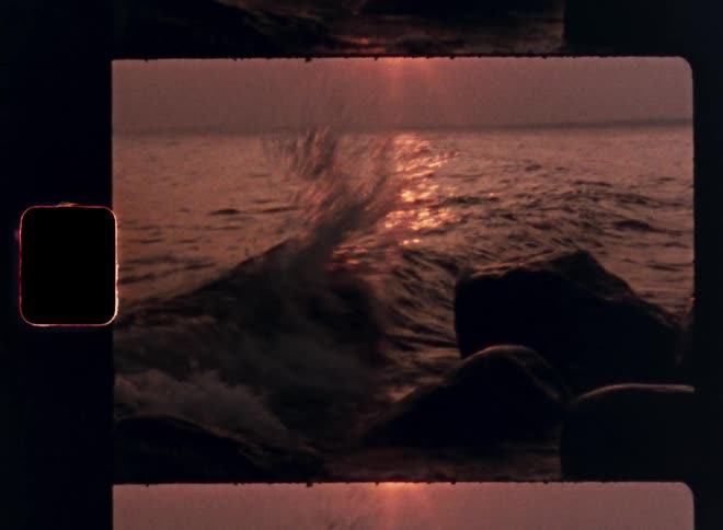 Waves crash against the rocks