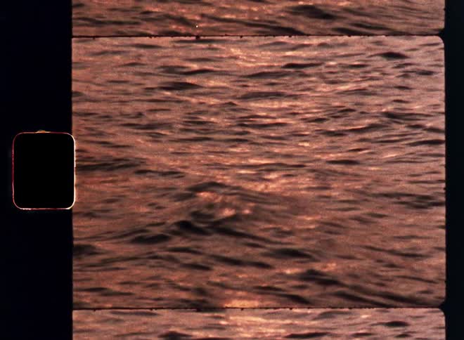 Sunset reflects on the ocean waves