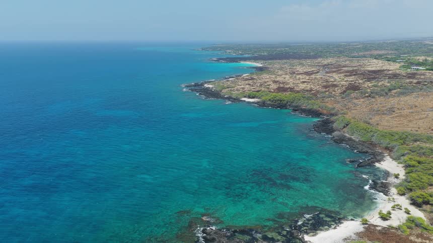 The island is lined with blue water