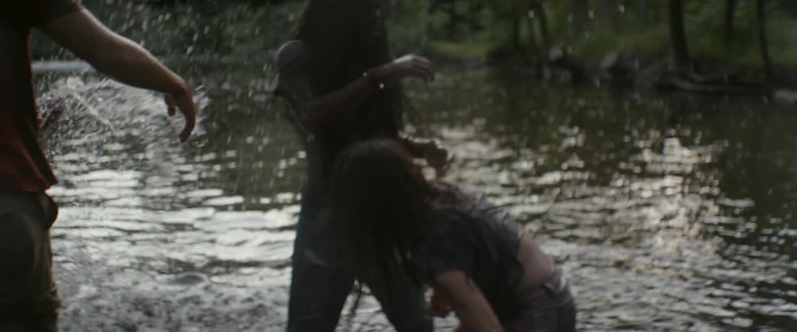 People are playing splashing in the lake