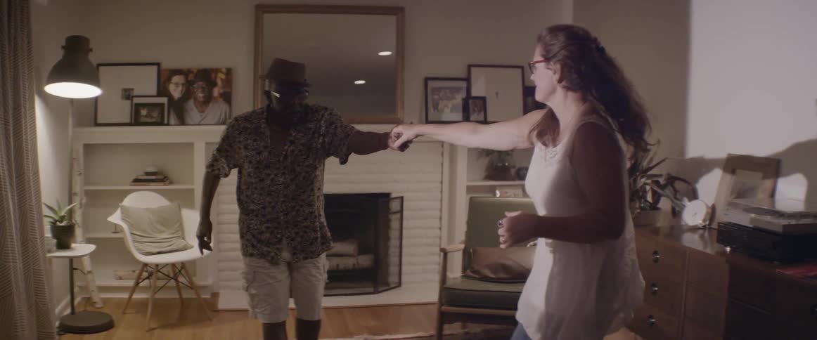 A man and woman dance together