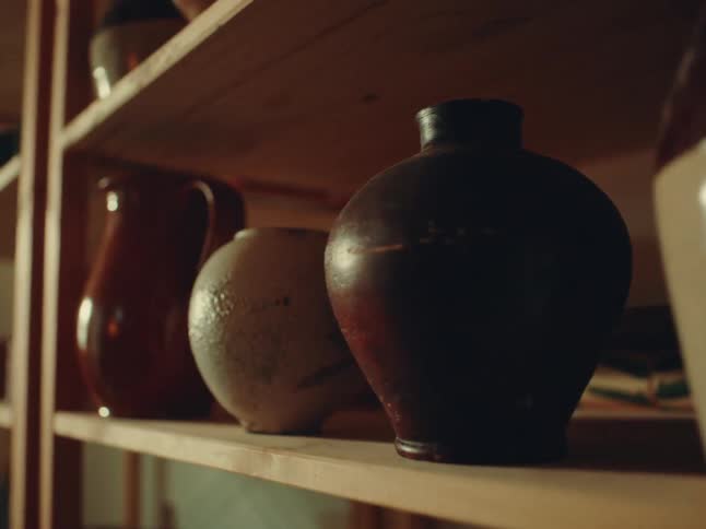A shelf of pottery
