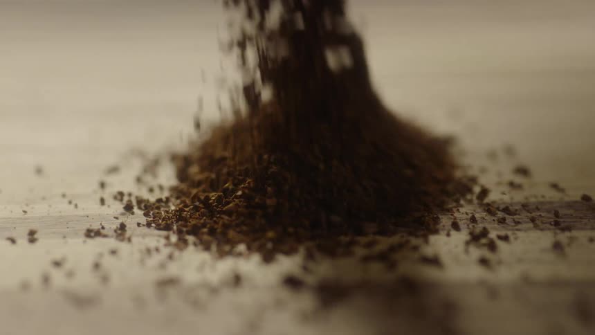 Ground substance being poured slowly on a surface