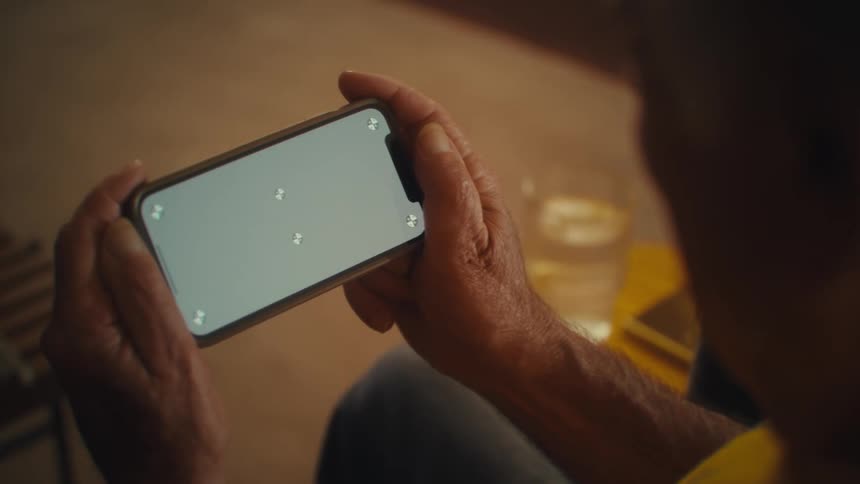 Hands hold a smartphone