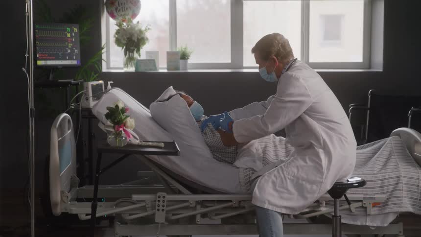 The doctor is examining a patient