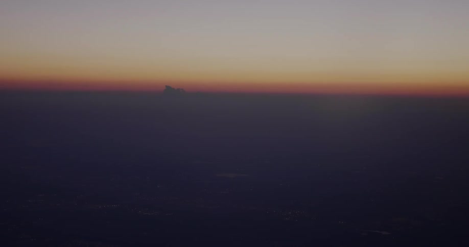 The sun sets over the horizon