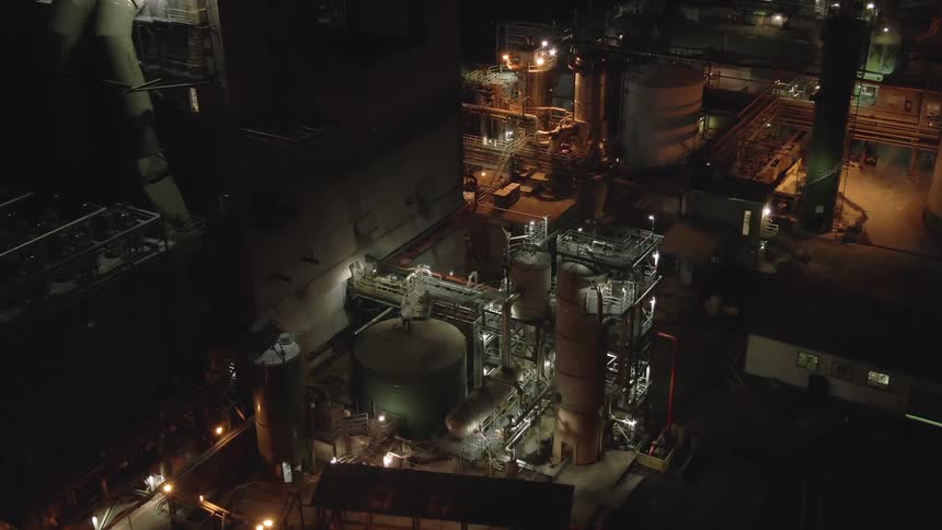 A large factory at night