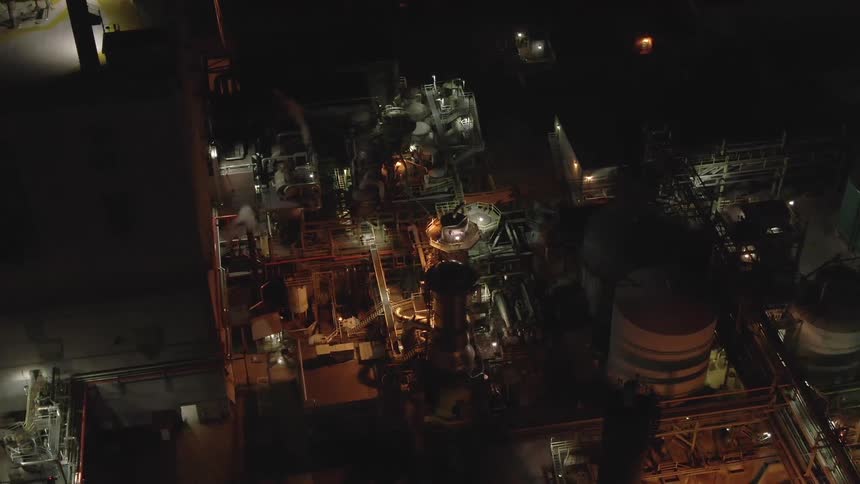 Aerial nighttime view of a complex industrial facility